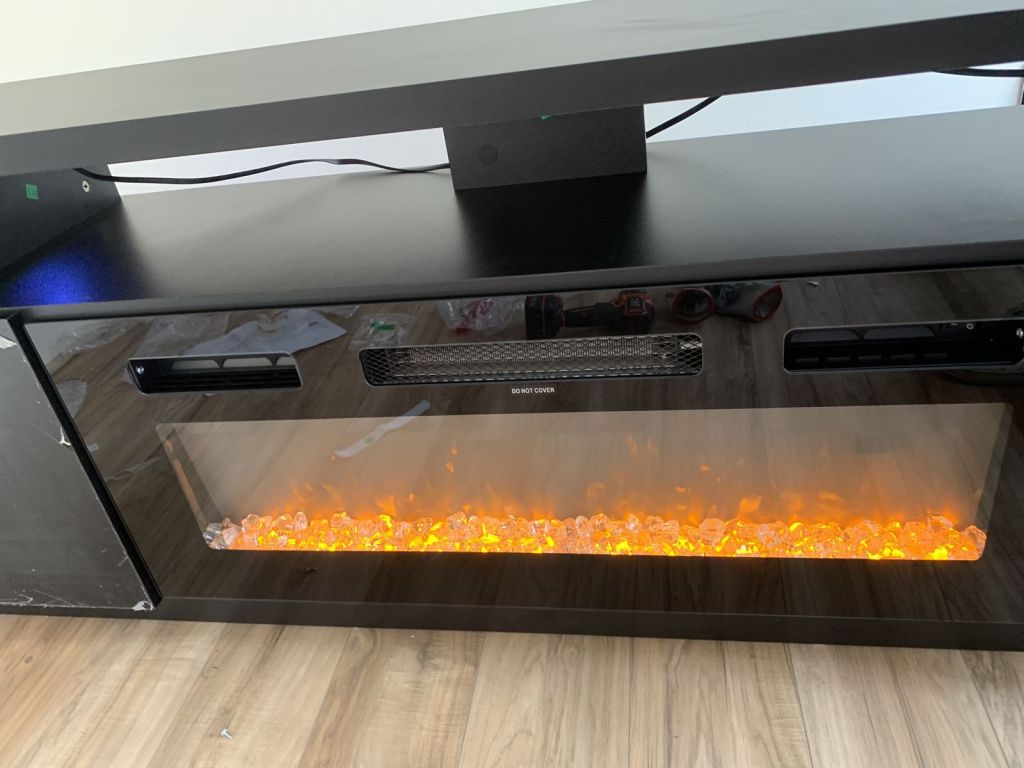 TV unit with built-in electric fireplace assembled